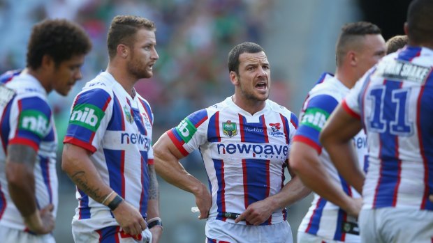 Beaten: Jarrod Mullen looks dejected after a Rabbitohs try.