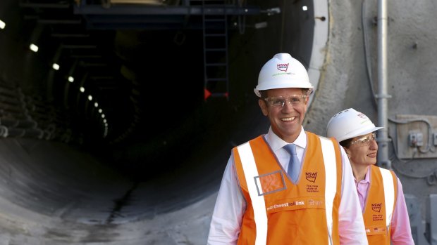 Mike Baird at the North West Rail Link construction site with Gladys Berejiklian on Friday. 