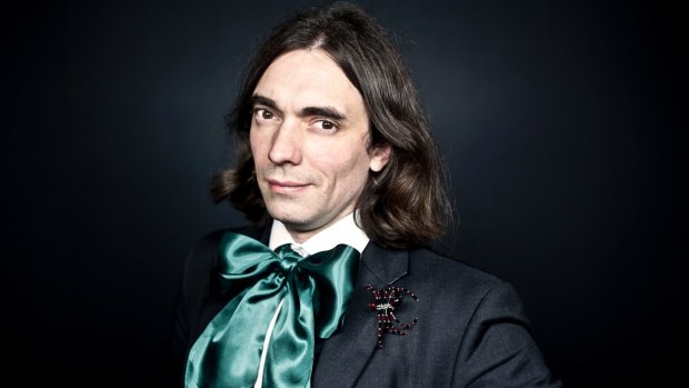 Mathematician Cedric Villani with one of his many trademark spider brooches. 