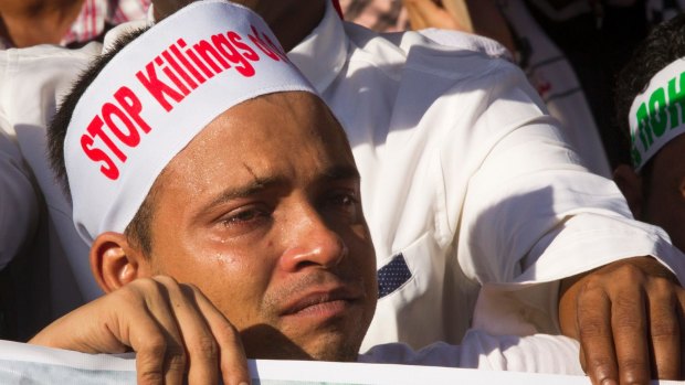 A Rohingya man living in Malaysia cries during a December 4 protest in Kuala Lumpur against the persecution of Rohingyas in Myanmar.