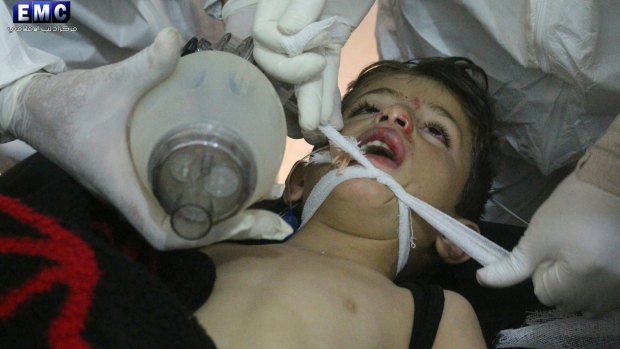 Syrian doctors treat a child following a suspected chemical attack in Syria, in a photo provided by the Syrian anti-government activist group Edlib Media Centre.