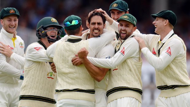 Mitchell Johnson rejoices in yet another wicket with his teammates.
