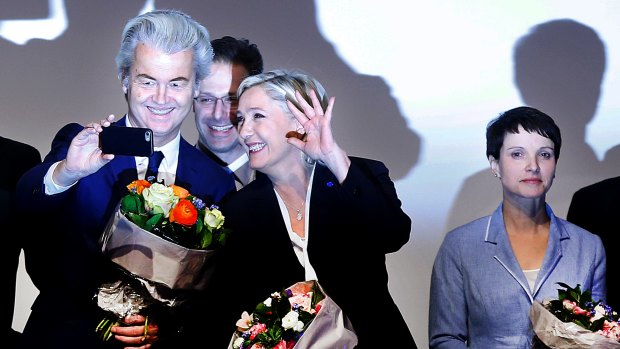 Dutch Freedom Party leader Geert Wilders, left, and French presidential candidate Marine Le Pen enjoy a selfie with Marcus Pretzell while his wife, Alternative for Germany leader Frauke Petry, stands to one side after a summit of European far-right leaders in Koblenz.