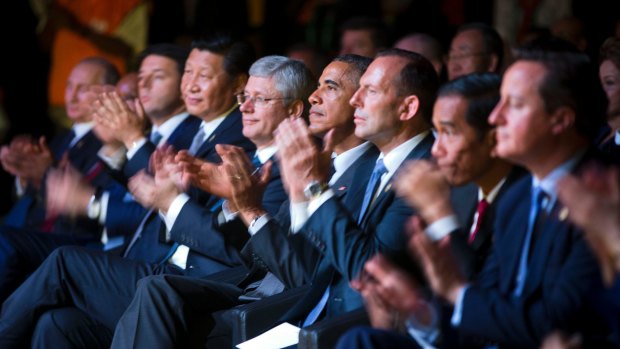 G20 leaders watching a cultural performance of indigenous dancers that summit in Brisbane.