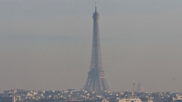 Dimmed: The City of Lights is under a blanket of smog