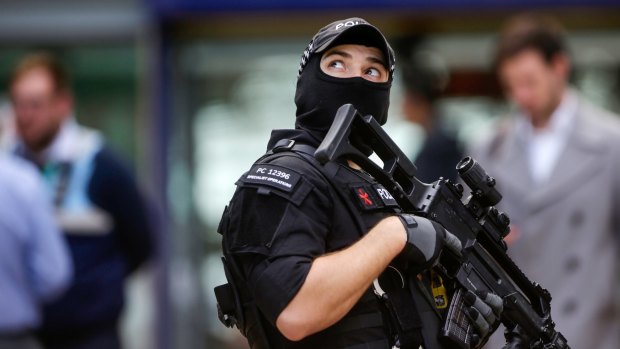 An armed police officer at Manchester Piccadilly railway station in Manchester.
