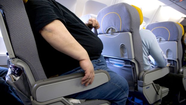 Should passengers be compensated for being seated next to a person of size?