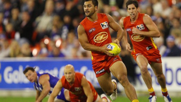Karmichael Hunt in action for the Suns in 2012.