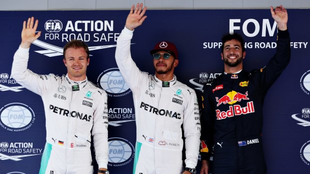 On track: Top three qualifiers, Lewis Hamilton Nico Rosberg and Daniel Ricciardo celebrate at the Spanish Formula One Grand Prix at Circuit de Catalunya.