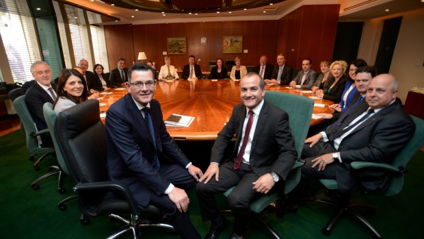 Merlino (centre right) has been backed by his boss Daniel Andrews, who described him as an 'outstanding' deputy.