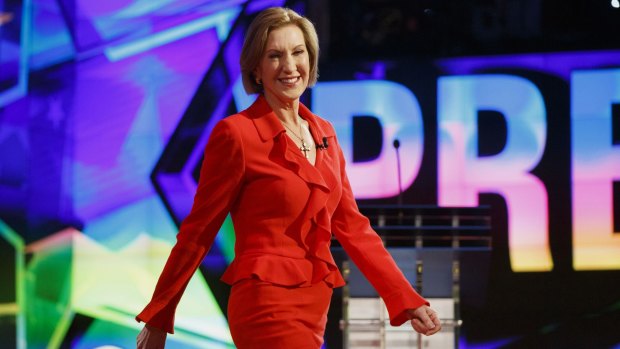 Carly Fiorina walks on stage at the start of the first Republican debate.