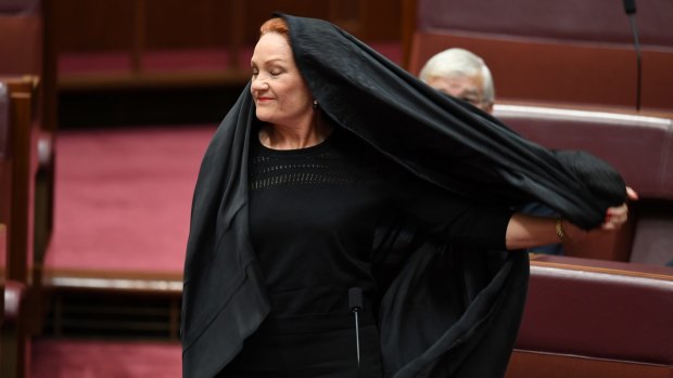 Pauline Hanson emerges from the burqa in August