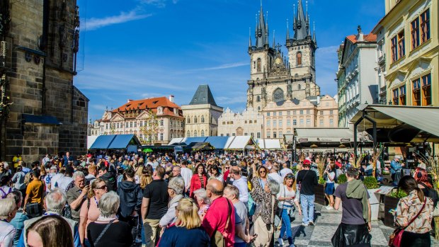 Crowds of tourists at the Old Town Square in Prague.