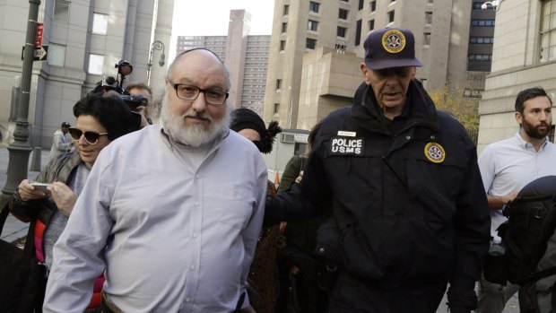 Convicted spy Jonathan Pollard leaves the federal courthouse in New York on Friday.