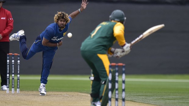 Tough task: Sri Lanka's Lasith Malinga bowls to South African batsman Hashim Amla.