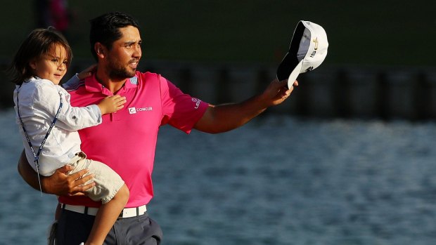 Jason Day, pictured with son Dash, will face off against Jordan Spieth and Rory McIlroy in the Jack Nicklaus' Memorial Tournament.