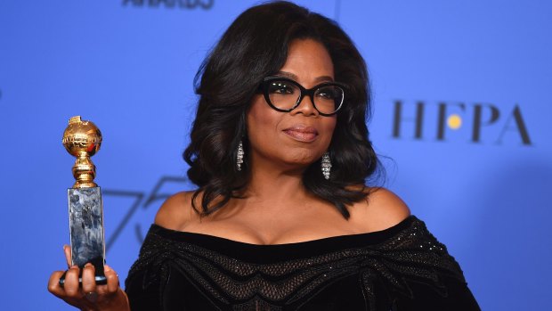 Oprah Winfrey with er Cecil B. DeMille Award at the 75th annual Golden Globe Awards.