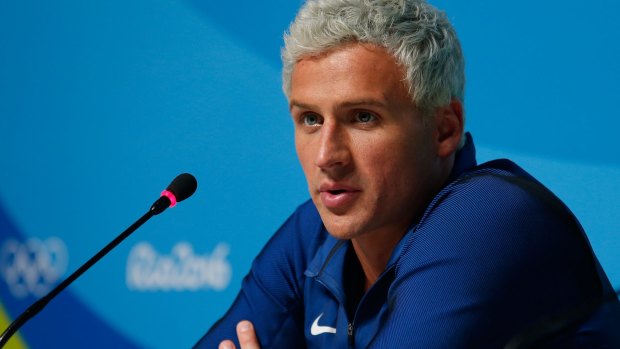 Ryan Lochte was in a taxi wehn it was reportedly held up.