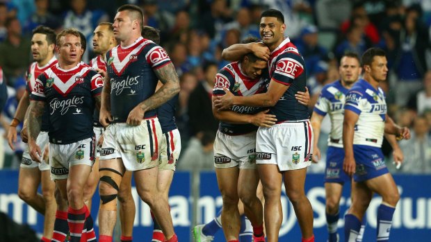Dominant: Roger Tuivasa-Sheck is congratulated by Daniel Tupou of the Roosters after scoring a try during the NRL semi between the Sydney Roosters and the Canterbury Bulldogs at Allianz Stadium.