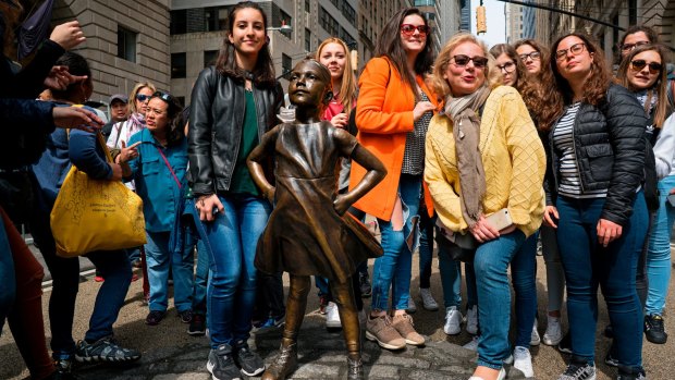 "Fearless Girl" became a popular tourist attraction.