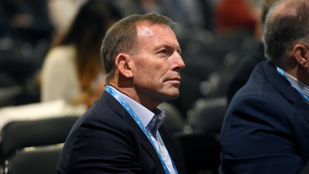Tony Abbott listens to Malcolm Turnbull speak at the NSW Liberal Party Futures Convention.