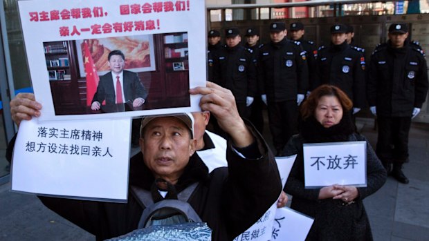 Relatives of passengers onboard the missing Malaysia Airlines Flight 370 demand the Chinese government continues the search last year.