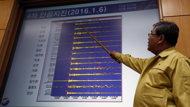 Korea Meteorological Administration official Ko Yun-hwa shows  seismic waves that were measured in South Korean cities.