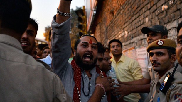 A member of the Hindu nationalist RSS movement condemns the protesters. 