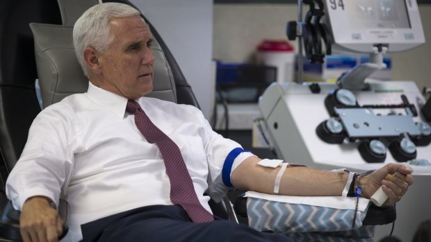 US Vice-President Mike Pence donates blood in Phoenix.