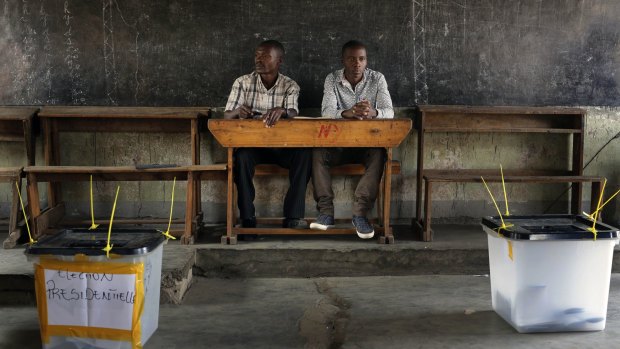 Election observers in an empty polling station in Bujumbura.