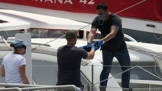 After months of surveillance, state and federal police swooped on the 14-metre twin-hull yacht.
