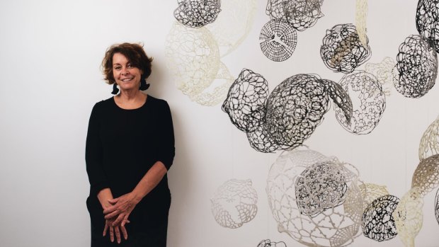 Canberra Glassworks curator Jane Cush with Naire Orthu by Ursula Halpin.