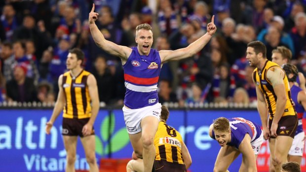 The Bulldogs' Jake Stringer celebrates after kicking a goal during the semi-final win against Hawthorn on Friday night. 