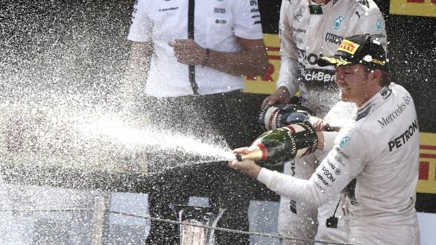 Mercedes driver Nico Rosberg sprays sparkling wine on the podium after winning the Spanish F1 Grand Prix at the Barcelona Catalunya racetrack on Sunday.