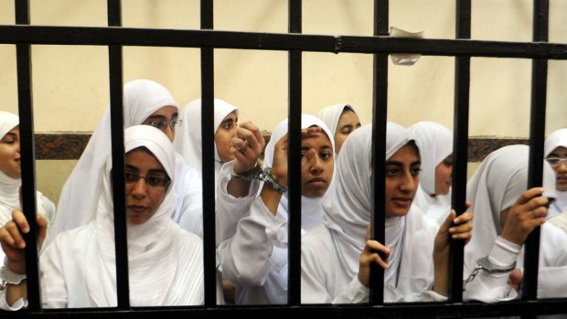 Female members of the Muslim Brotherhood during their trial in the Egyptian city of Alexandria in November 2013. 