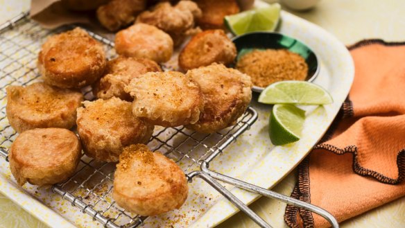 Little sweet potato fritters with chicken salt, lime and sour cream.