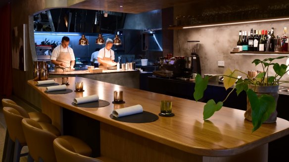 Owner-chef Clinton McIver (left) on the pans at Amaru in Armadale.