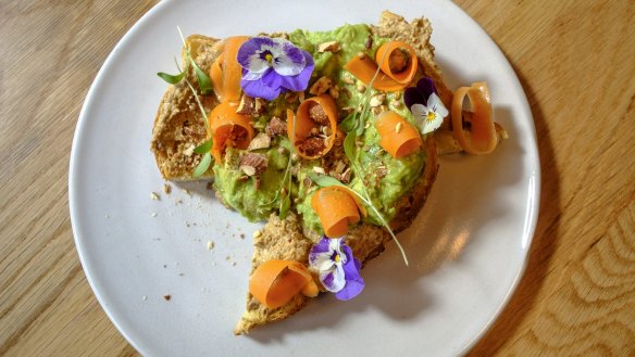 Avocado on toast with pickled carrot.