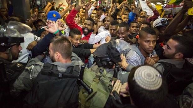 Police and Israeli Ethiopians clash in Jerusalem last week. Similar protests were held in Tel Aviv on Sunday. 