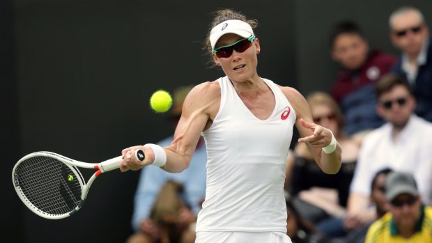 Straight-sets win: Samantha Stosur plays a return to Magda Linette.