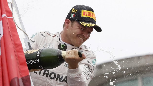 Big win: Nico Rosberg celebrates on the podium after winning the Italian Grand Prix.