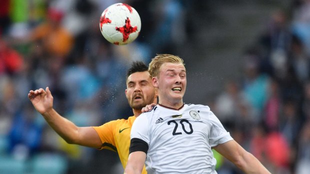 Germany's Julian Brandt, right, and Australia's Bailey Wright go for a header during the Confederations Cup.