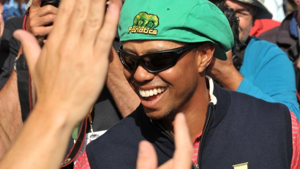 Last time: Tiger Woods got into the spirit after the USA's victory four years ago.