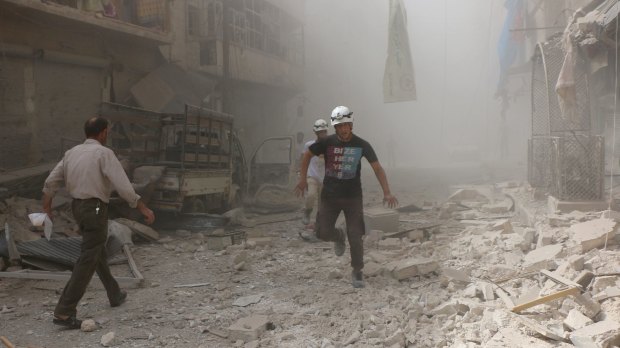 Rescue teams search damaged buildings after Assad forces and the Russian army carried out airstrikes on opposition controlled areas in Aleppo last weekend.