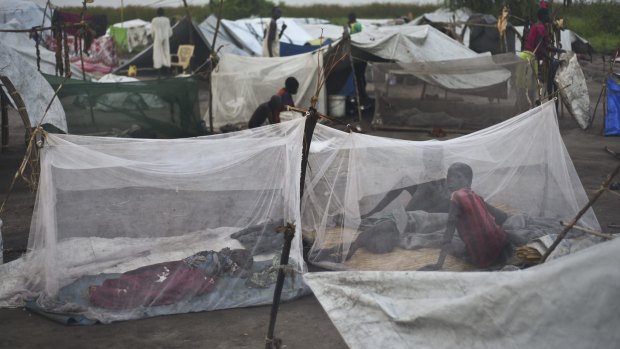 Some of the about 900 displaced people who have taken refuge sleep under only mosquito nets in the open because there are not enough tents, in Kok Island, Unity State,  South Sudan,  this month.