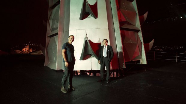 Set designer Dan Potra (left) and Lyndon Terracini, Artistic Director of Opera Australia, stand beside an 18-metre high pagoda which makes up part of the set for Handa Opera's <i>Turandot</i>.