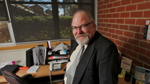 David Finnerty, principal at Hampton Park Secondary College, is refusing to sign the legal document and has been threatened with deregistration. 