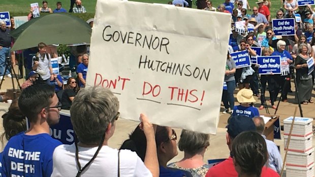 Protesters at the state Capitol building  in Little Rock on Friday.