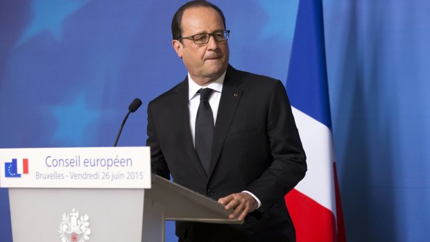 "The attack is terrorist in nature": French President Francois Hollande gives a statement at the European Council headquarters.