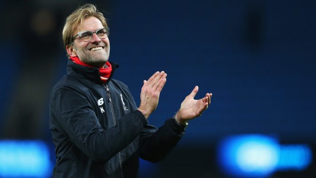Happy manager: Jurgen Klopp applauds the supporters after his team's 4-1 win in the Premier League match between Manchester City and Liverpool at Etihad Stadium.